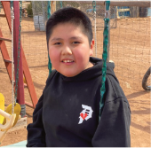 native indian boy with black jacket donations